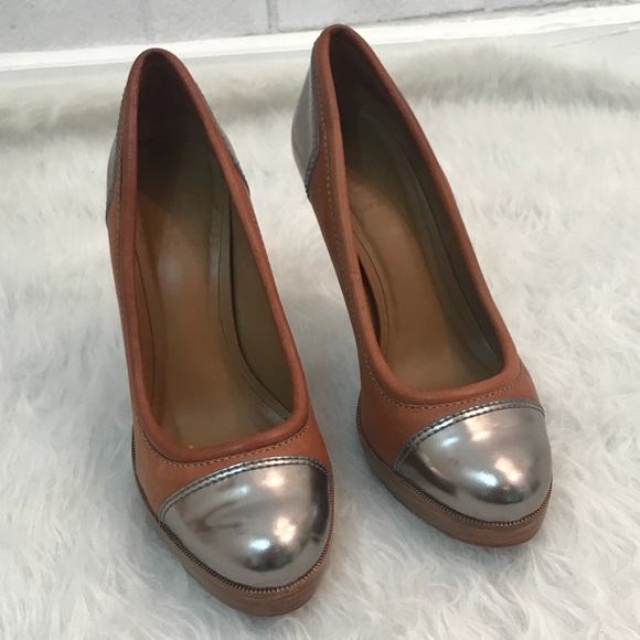 tory burch round toe pumps